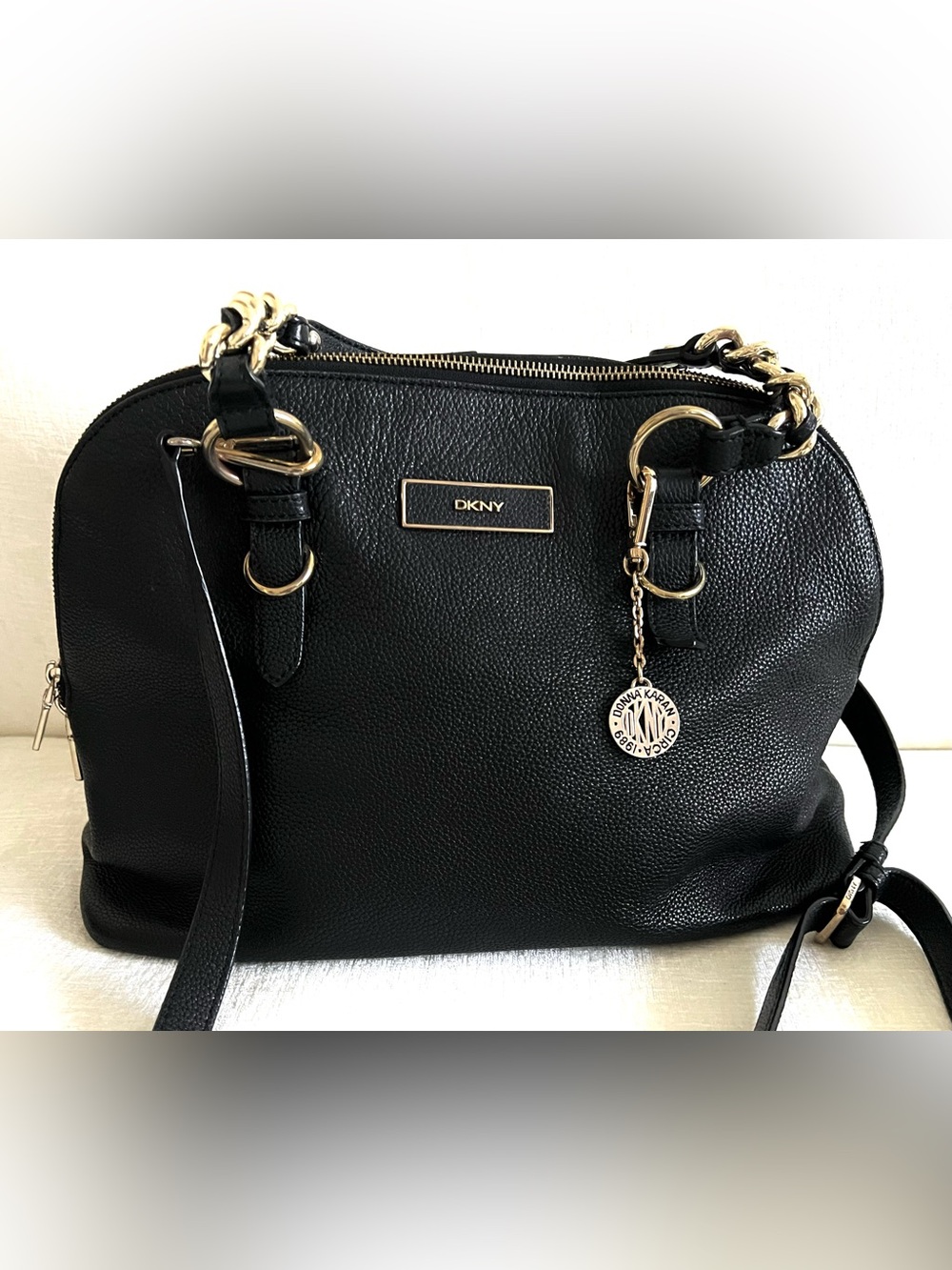DKNY Black Pebbled Leather Shoulder Bag with Gold Hardware and Logo Charm